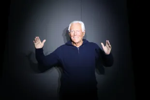 MILAN, ITALY - JANUARY 13: Designer Giorgio Armani walks the runway at the Emporio Armani fashion show during the Milan Menswear Fall/Winter 2024-2025 on January 13, 2024 in Milan, Italy. (Photo by Daniele Venturelli/WireImage)