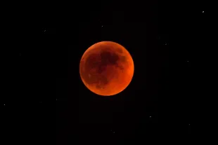JERUSALEM, ISRAEL - JUNE 15: (ISRAEL OUT) A total lunar eclipse is seen on June 15, 2011 in Jerusalem, Israel. The longest lunar eclipse for a decade took place tonight. A lunar eclipse comes when the sun, Earth and moon line up and Earth's shadow falls on the moon. (Photo by Uriel Sinai/Getty Images)