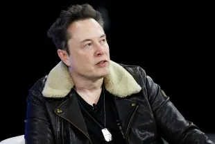 NEW YORK, NEW YORK - NOVEMBER 29: C.E.O. of Tesla, Chief Engineer of SpaceX and C.T.O. of X Elon Musk speaks during the New York Times annual DealBook summit on November 29, 2023 in New York City. Andrew Ross Sorkin returns for the NYT summit for a day of interviews with Vice President Kamala Harris, President of Taiwan Tsai Ing-Wen, C.E.O. of Tesla, Chief Engineer of SpaceX and C.T.O. of X Elon Musk, former Speaker of the U.S. House of Representatives Rep. Kevin McCarthy (R-CA) and leaders in business, politics and culture.  (Photo by Michael M. Santiago/Getty Images)