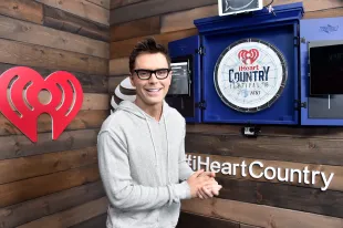 AUSTIN, TX - MAY 05:  (EDITORIAL USE ONLY. NO COMMERCIAL USE) Co-host Bobby Bones poses backstage at the 2018 iHeartCountry Festival By AT&T at The Frank Erwin Center on May 5, 2018 in Austin, Texas.  (Photo by Frazer Harrison/Getty Images for iHeartMedia)