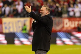Jim Cornelison sings the National Anthem before a game between Houston Dynamo FC and Chicago Fire FC. (Image via Getty)