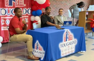 Charleston White speaking at a HBCU (Image via YouTube/The Real Charleston White)