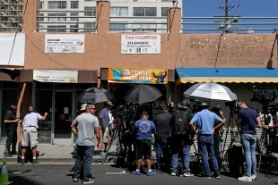 LOS ANGELES, CA - JULY 20: The media gathers where a $1-billion Powerball ticket was sold at Las Palmitas Mini Market in downtown on Thursday, July 20, 2023 in Los Angeles, CA. The winner, who remains unidentified, purchased their ticket at Las Palmitas Mini Market at East 12th Street and Wall Street. (Gary Coronado / Los Angeles Times via Getty Images)