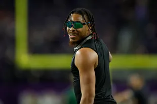 MINNEAPOLIS, MINNESOTA - DECEMBER 31: Justin Jefferson #18 of the Minnesota Vikings warms up prior to a game against the Green Bay Packers at U.S. Bank Stadium on December 31, 2023 in Minneapolis, Minnesota. (Photo by David Berding/Getty Images)
