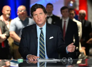 Tucker Carlson speaks during 2022 FOX Nation Patriot Awards at Hard Rock Live at Seminole Hard Rock Hotel & Casino Hollywood on November 17, 2022 in Hollywood, Florida (Image via Getty)
