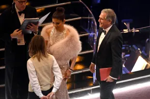 Big Brother host Julie Chen and CBS Chairman Leslie Moonves (Image via Getty)