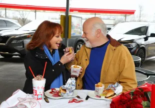 Reba McEntire and Rex Linn make it official on the Emmys red carpet after quietly building a life together for years.
