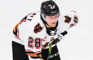 Orca Wiesblatt of the Calgary Hitmen in action against the Lethbridge Hurricanes during a WHL game at Seven Chiefs Sportsplex on March 20, 2021 in Calgary, Alberta, Canada. (Photo by Derek Leung/Getty Images