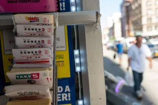 NEW YORK CITY - SEPTEMBER 05: Powerball tickets are displayed in a newsstand in Manhattan as the Powerball Jackpot now reaches $1.8 billion on September 05, 2025, in New York City. Saturday night's drawing will follow no winners from Wednesday's $1.4 billion grand prize, Powerball said. (Photo by Spencer Platt/Getty Images)