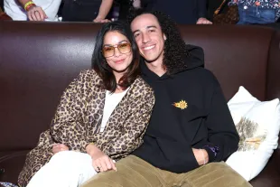 Fans gush over Hudgens’ glowing maternity style as she documents her dreamy Italian escape with Cole Tucker.