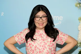 Jenny Han said that Taylor Swift's Dress is one of her favorite songs (Image via Getty)