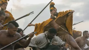 Jason Momoa as Ka‘iana rallies warriors during the lava-field battle in Chief of War season 1 episode 9 (The Black Desert). Image via Apple TV+.