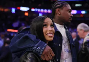 Cardi B was heard speaking about her relationship with Stefon Diggs while she announced her pregnancy (Image via Getty)