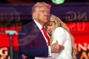 Erika Kirk joins U.S. President Donald Trump onstage during the memorial service for political activist Charlie Kirk at State Farm Stadium on September 21, 2025 in Glendale, Arizona. (Photo by Win McNamee/Getty Images)