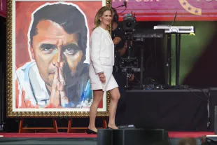 Philanthropist Rebecca Dunn walks onstage during the memorial service for political activist Charlie Kirk at State Farm Stadium on September 21, 2025 in Glendale, Arizona. (Photo by Joe Raedle/Getty Images)