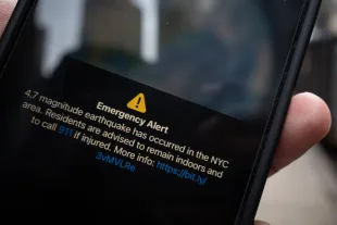 NEW YORK, NEW YORK - APRIL 5: In this photo illustration, an emergency alert is displayed from the national Emergency Broadcast System warning of an earthquake in the area on April 5, 2024 in New York City. The earthquake was first reported as 4.7 magnitude but later upgraded to 4.8. There were no reported injuries in the late morning earthquake, but many people reported visible shaking in buildings and homes. Tremors were felt from Philadelphia to Boston. (Photo Illustration by David Dee Delgado/Getty Images)