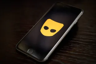 The "Grindr" app logo.  (Photo by Leon Neal/Getty Images)