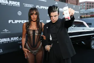 LONDON, ENGLAND - JULY 18: Jesse Jo Stark and Yungblud attend the UK Launch of 'Gin & Juice By Dre and Snoop' at Flipper's Roller Boogie Palace on July 18, 2024 in London, England. (Photo by Kevin Mazur/Getty Images for Flipper's)