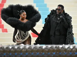 NEW YORK, NEW YORK - MAY 02:  Yung Miami and Sean 'Diddy' Combs leave The 2023 Met Gala Celebrating "Karl Lagerfeld: A Line Of Beauty" at The Metropolitan Museum of Art on May 01, 2023 in New York City.  (Photo by James Devaney/GC Images)