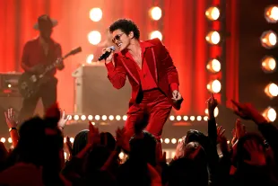 LOS ANGELES, CALIFORNIA - NOVEMBER 21: In this image released on November 21, Bruno Mars of Silk Sonic perform onstage for the 2021 American Music Awards at Microsoft Theater broadcast on November 21, 2021 in Los Angeles, California. (Photo by John Esparza via Getty Images)