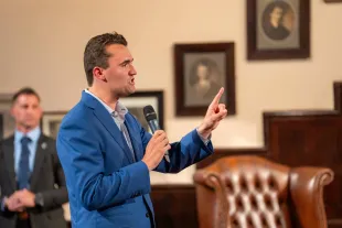 CAMBRIDGE, CAMBRIDGESHIRE - MAY 19: Charlie Kirk debates with students at The Cambridge Union on May 19, 2025 in Cambridge, Cambridgeshire. (Photo by Nordin Catic/Getty Images for The Cambridge Union)