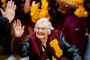Jean Dolores Schmidt BVM, Sister Jean, a chaplain for the Loyola-Chicago Ramblers celebrates a victory after a game (Image via Getty)