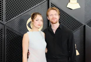 Finneas and Claudia Sulewski first met on a dating app called Raya (Image via Getty)