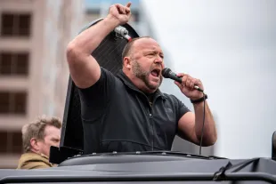 AUSTIN, TX - APRIL 18: Infowars host Alex Jones arrives at the Texas State Capital building on April 18, 2020 in Austin, Texas. The protest was organized by Infowars host Owen Shroyer who is joining other protesters across the country in taking to the streets to call for the country to be opened up despite the risk of the COVID-19. (Photo by Sergio Flores/Getty Images)