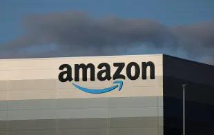 HAYDOCK, ENGLAND - OCTOBER 15: The Amazon logo is displayed outside Amazon UK MAN8 Warehouse on October 15, 2023 in Haydock, United Kingdom. (Photo by Nathan Stirk/Getty Images)