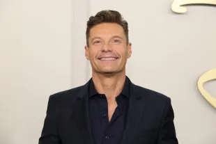 Ryan Seacrest is the co-host of Celebrity Wheel of Fortune season 43 (Image via Getty)