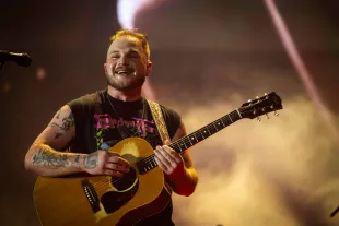 NASHVILLE, TENNESSEE - JUNE 29: Zach Bryan performs during the Quittin Time tour at Nissan Stadium on June 29, 2024 in Nashville, Tennessee. (Photo by Keith Griner/Getty Images)