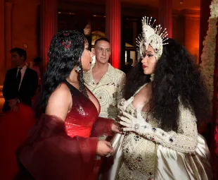 NEW YORK, NY - MAY 07: Nicki Minaj, Designer Jeremy Scott, and Cardi B attend the Heavenly Bodies: Fashion & The Catholic Imagination Costume Institute Gala at The Metropolitan Museum of Art on May 7, 2018 in New York City.  (Photo by Kevin Mazur/MG18/Getty Images for The Met Museum/Vogue)