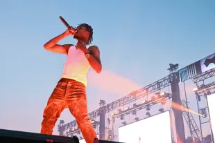 NEW YORK, NEW YORK - SEPTEMBER 23: Lil TJay performs during Rolling Loud at Citi Field on September 23, 2022 in New York City. (Photo by Astrida Valigorsky/Getty Images)