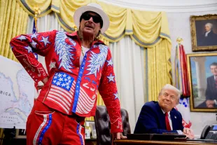 President Donald Trump listens as entertainer Kid Rock speaks during an executive order signing event in the Oval Office of the White House on March 31, 2025 in Washington, DC. (Photo by Andrew Harnik/Getty Images)