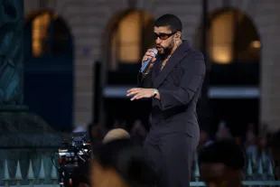 PARIS, FRANCE - JUNE 23: Bad Bunny performs during Vogue World: Paris at Place Vendome on June 23, 2024 in Paris, France. (Photo by Marc Piasecki/Getty Images for Vogue)