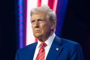 U.S. President-elect Donald Trump looks on during Turning Point USA's AmericaFest at the Phoenix Convention Center on December 22, 2024 in Phoenix, Arizona. The annual four day conference geared toward energizing and connecting conservative youth hosts some of the country's leading conservative politicians and activists. (Photo by Rebecca Noble/Getty Images)