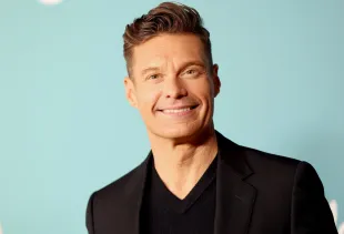 Celebrity Wheel of Fortune host Ryan Seacrest attends the "American Idol" Season 22 Top 10 Event (Image via Getty)
