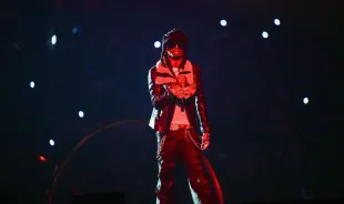 ATLANTA, GEORGIA - AUGUST 21: Playboi Carti performs during The Weeknd: After Hours Til Dawn Tour at Mercedes-Benz Stadium on August 21, 2025 in Atlanta, Georgia. (Photo by Prince Williams/WireImage)