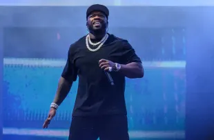 LONDON, ENGLAND - JULY 3: 50 Cent performs onstage during a concert at Tottenham Hotspur Stadium on July 3, 2025 in London, England. (Photo by Katja Ogrin/Getty Images)