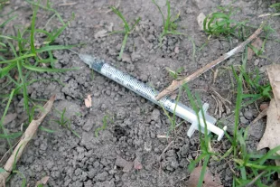 Amine Mojito pretended using a syringe on random individuals (Image via Getty)