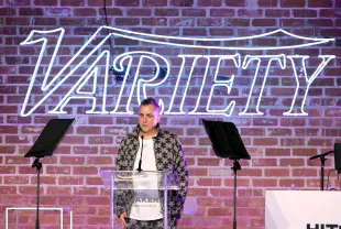 LOS ANGELES, CALIFORNIA - DECEMBER 04: Mike Dean accepts the Producer of the Year award presented by Beatclub onstage during Variety's Hitmakers Brunch presented by Peacock | Girls5eva on December 04, 2021 in Downtown Los Angeles. (Photo by Kevin Winter/Getty Images for Variety)