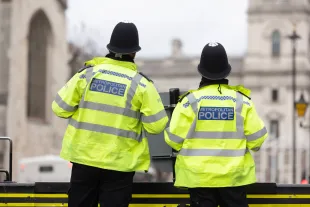 LONDON, ENGLAND - MARCH 21: Metropolitan Police officers outside the Houses of Parliament on March 21, 2023 in London, England. A report published today of behavioural standards and internal culture of the Metropolitan Police Service, conducted by Baroness Louise Casey and commissioned in the wake of the murder of Sarah Everard by a serving officer, suggested the force could be broken up if it fails to improve. (Photo by Dan Kitwood/Getty Images)