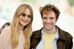 CANNES, FRANCE - MAY 18: Jennifer Lawrence and Robert Pattinson during the "Die My Love" photocall at the 78th annual Cannes Film Festival at Palais des Festivals on May 18, 2025 in Cannes, France. (Photo by Lionel Hahn/Getty Images)