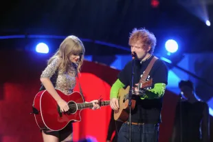 NEW YORK, NY - DECEMBER 07:  Taylor Swift and Ed Sheeran perform onstage during Z100's Jingle Ball 2012, presented by Aeropostale, at Madison Square Garden on December 7, 2012 in New York City.  (Photo by Jamie McCarthy/Getty Images for Jingle Ball 2012)