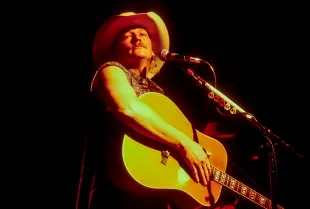 American Country musician Alan Jackson plays acoustic guitar as he performs onstage at Irving Plaza, New York, New York, January 19, 2000. (Photo by Jack Vartoogian/Getty Images)