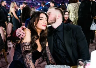 Brianna LaPaglia and Zach Bryan attend the 66th GRAMMY Awards on February 04, 2024 in Los Angeles, California (Image via Getty)