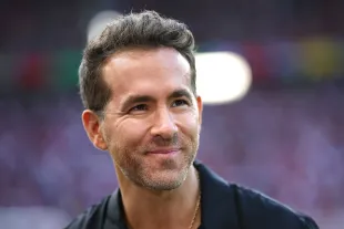  Ryan Reynolds enjoys the pre match atmosphere prior to the UEFA EURO 2024 quarter-final match between Netherlands and Türkiye at Olympiastadion on July 06, 2024 in Berlin, Germany. (Photo by Boris Streubel - UEFA/UEFA via Getty Images)