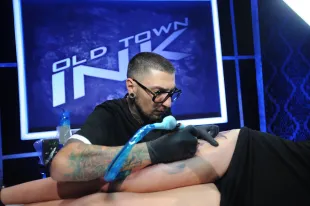 Season 17 Judge DJ Tambe, a three-time Ink Master champion  (Image via Getty)