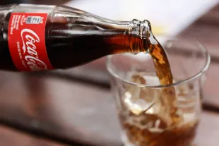 Coca-Cola is seen in this illustration photo taken in Krakow, Poland on June 30, 2024. (Photo by Jakub Porzycki/NurPhoto via Getty Images)