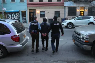 NEW YORK, NY - APRIL 11:  U.S. Immigration and Customs Enforcement (ICE), officers arrest an undocumented Mexican immigrant during a raid in the Bushwick neighborhood of Brooklyn on April 11, 2018 in New York City. New York is considered a "sanctuary city" for undocumented immigrants, and ICE receives little or no cooperation from local law enforcement.  ICE said that officers arrested 225 people for violation of immigration laws during the 6-day operation, the largest in New York City in recent years. (Photo by John Moore/Getty Images)